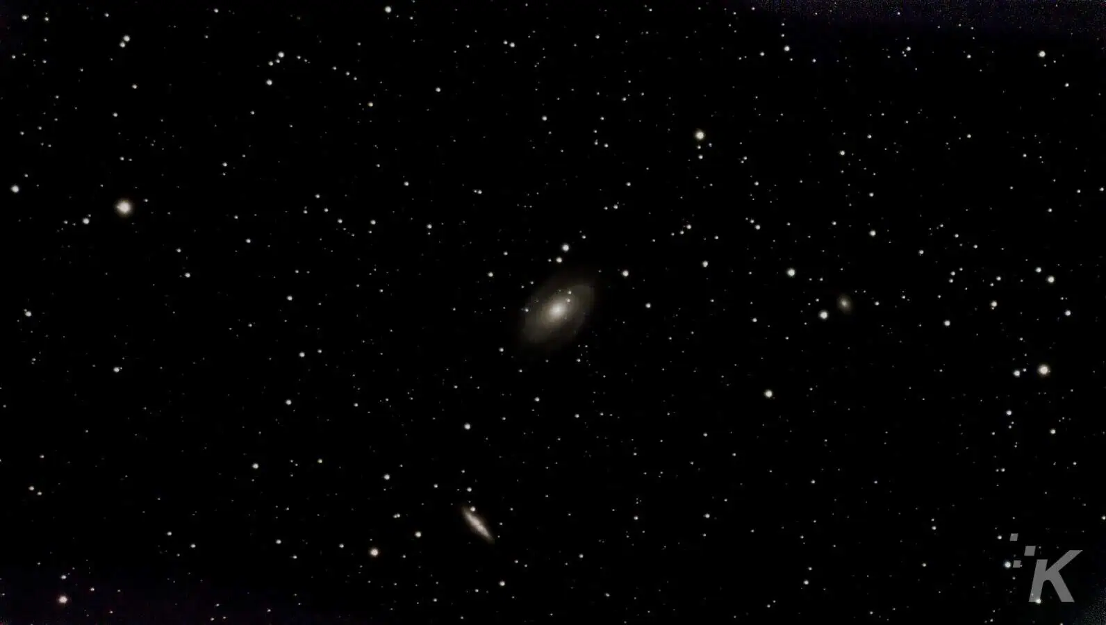 Starry night sky with distant galaxies.