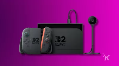 Nintendo Switch 2 console and controllers on purple background.