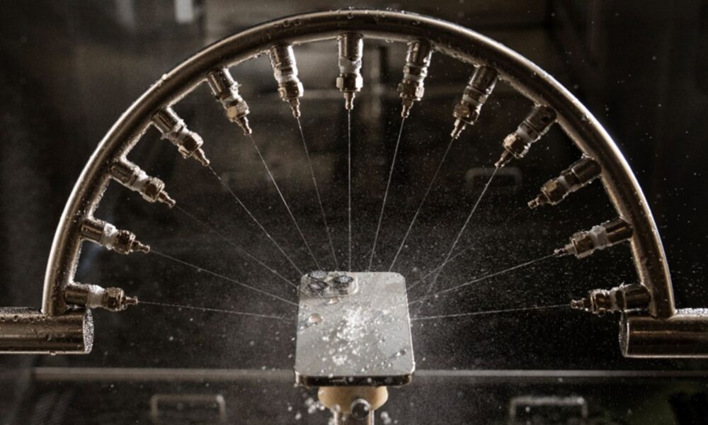 Industrial spray nozzles in operation.