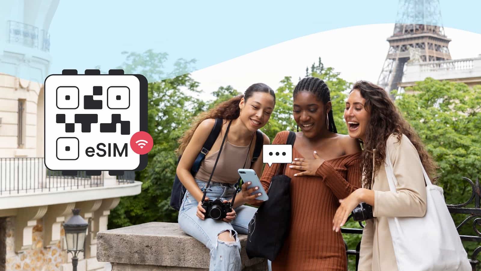 Three women are taking pictures with their phones.
