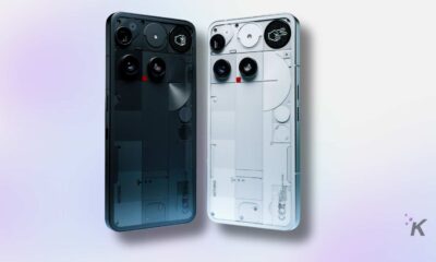 Two transparent smartphones, black and white versions