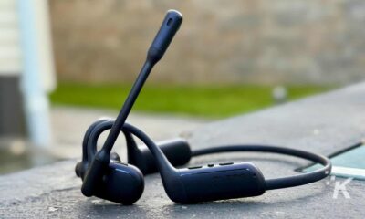 Black bone conduction headphones with mic on table