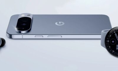 Smartphone, smartwatch, and earbuds on display