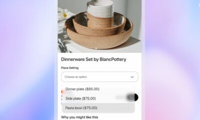 Minimalist ceramic dinnerware set with bowls, plates, and a mug on a white surface with a blurred background.