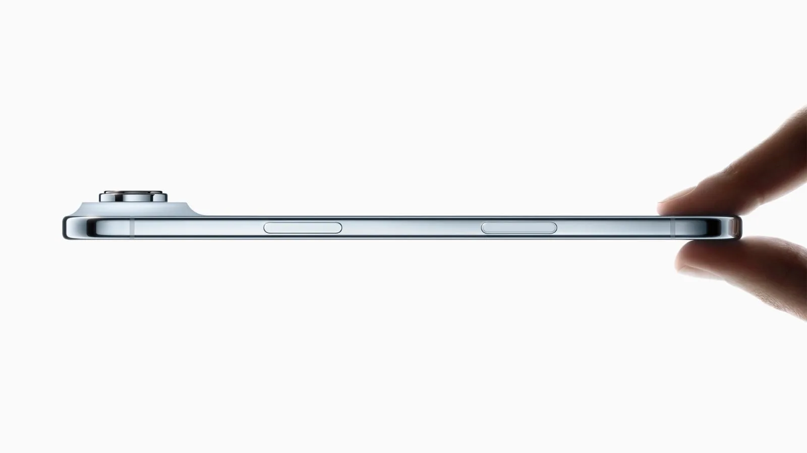 Side view of thin smartphone held with fingers.