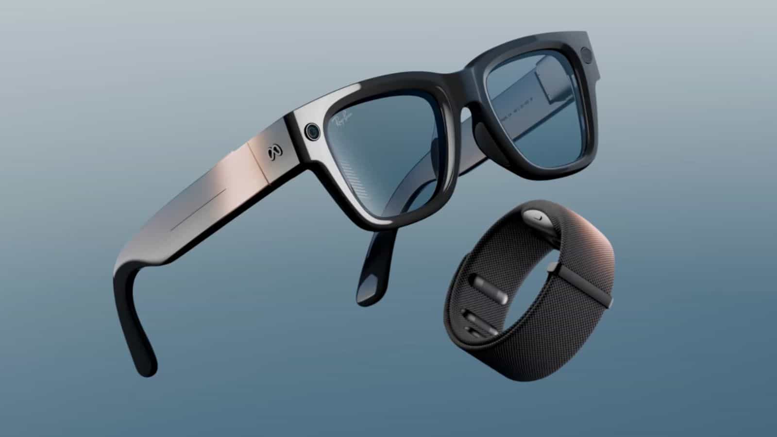 Smart glasses and wristband on blue background.