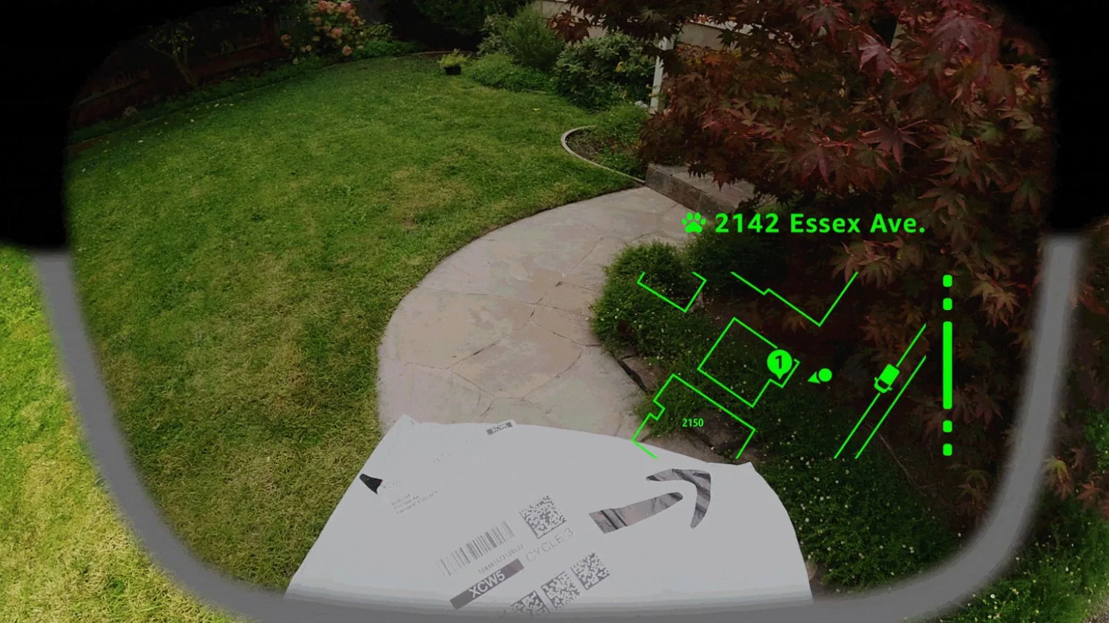 Fiber optic camera view of front yard showing sidewalk, grass, and landscaping, with digital overlay indicating address "2142 Essex Ave." and property layout, used for home security or smart home integration.