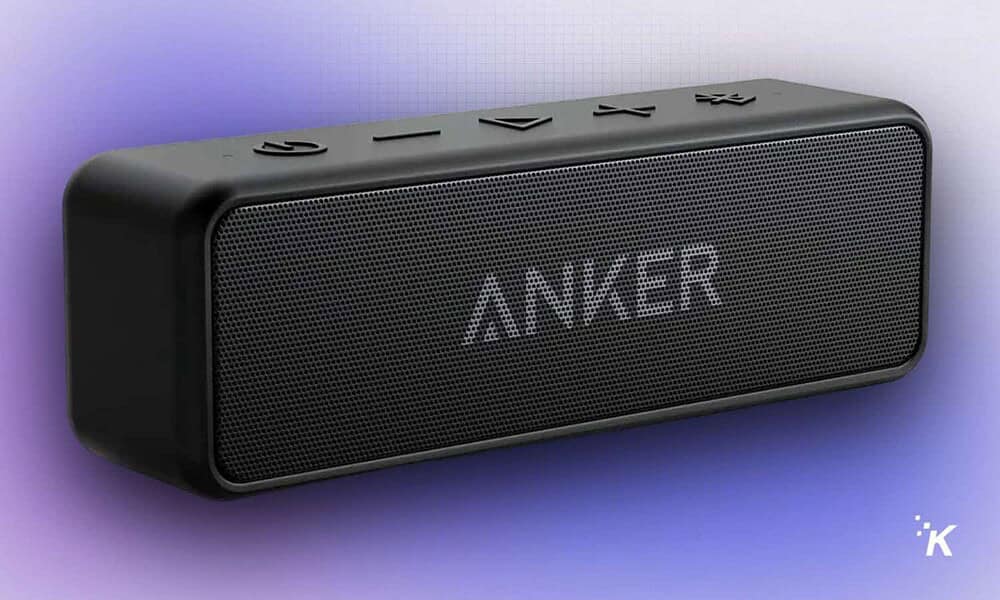 Wireless portable Bluetooth speaker with Anker branding, compact design, and control buttons on top, ideal for outdoor and indoor audio experiences.