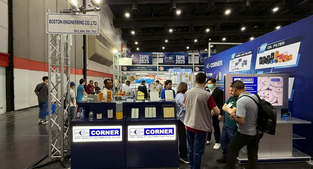 High-quality automotive filters booth at tech exhibition, showcasing oil filters, cabin filters, and air filters, with visitors exploring the latest in automotive filter technology.
