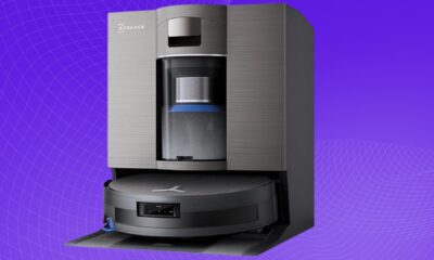 High-tech home cleaning robot with advanced navigation and AI capabilities, sleek gray design on purple digital background.