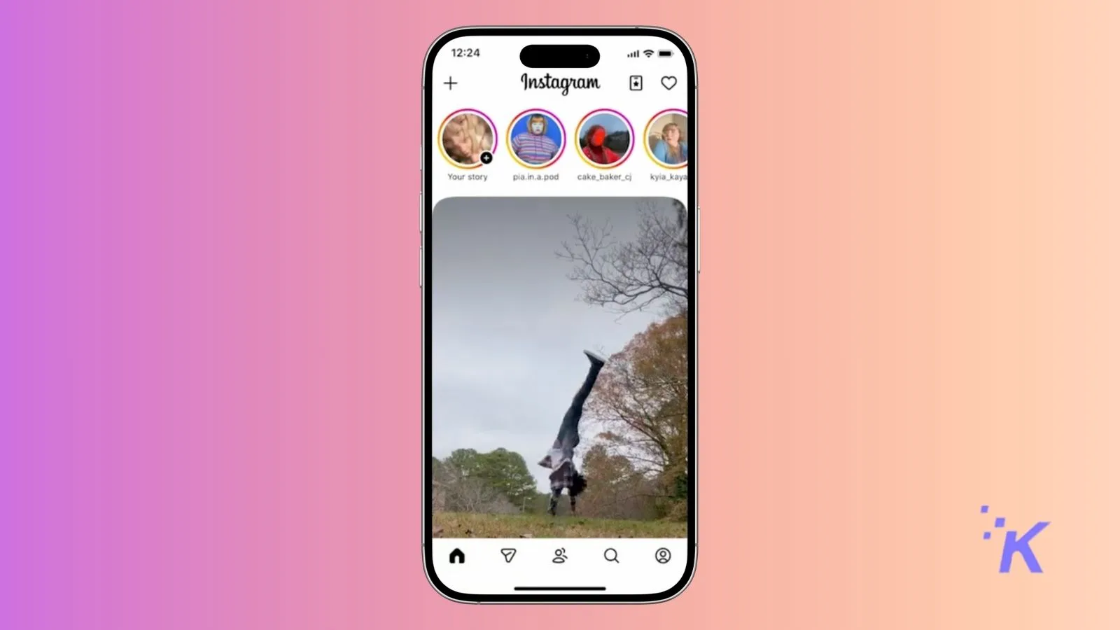 A person performing a handstand outdoors on an iPhone screen showing Instagram app interface with stories and icons.