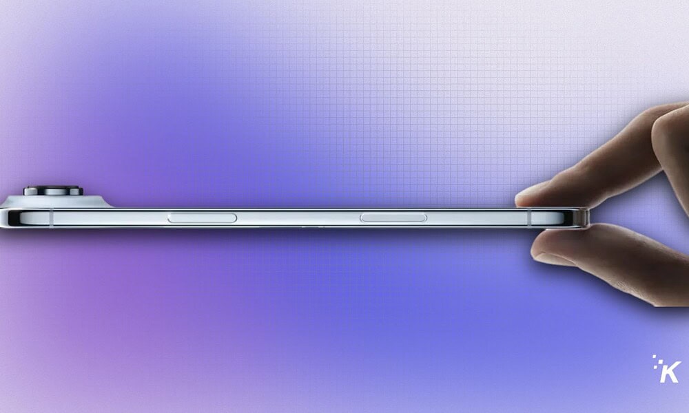 Sleek modern smartphone with a slim profile, held between fingers against a gradient purple background. Perfect for showcasing new mobile device design and technology features.