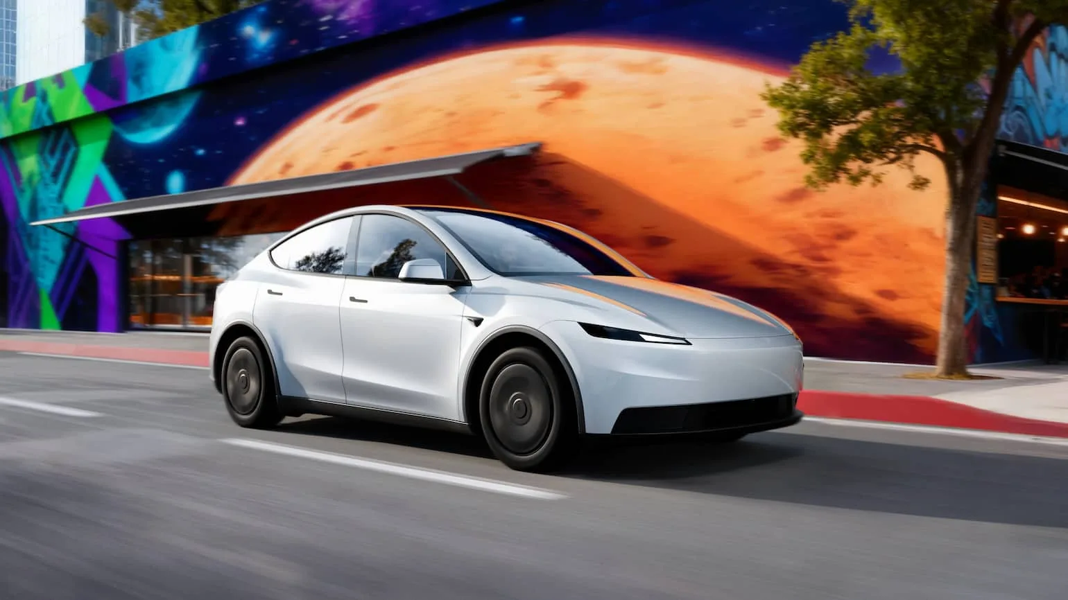 Futuristic white electric car driving past a vibrant mural featuring space and planetary artwork.