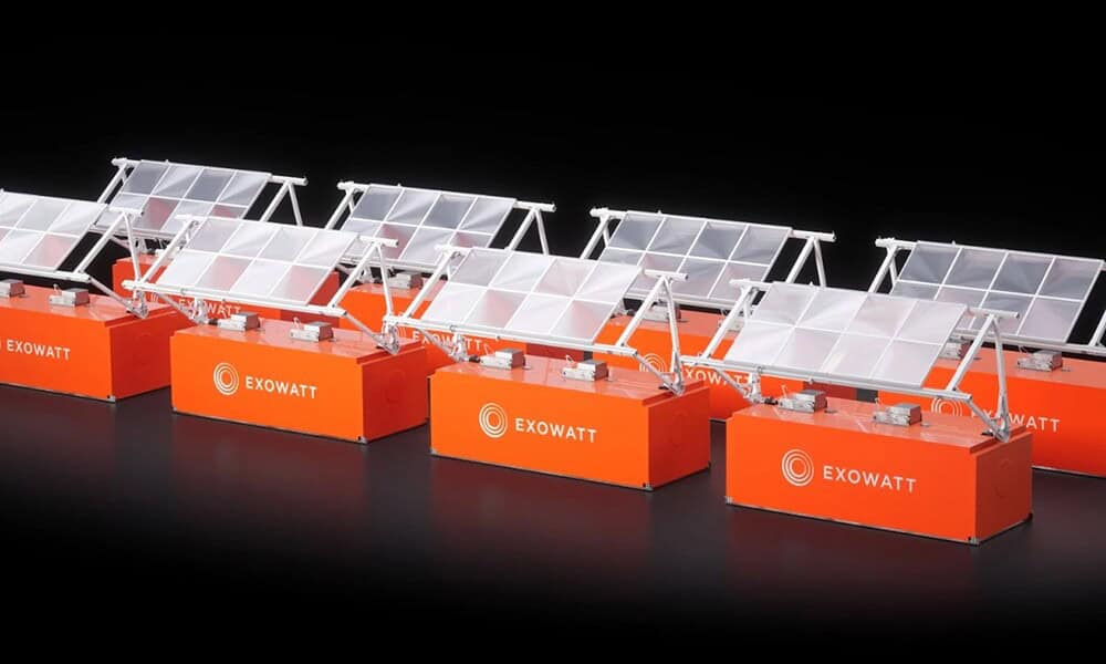 High-efficiency solar panels mounted on orange Exowatt branded bases, showcasing innovative renewable energy technology for sustainable power generation.