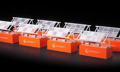 High-efficiency solar panels mounted on orange Exowatt branded bases, showcasing innovative renewable energy technology for sustainable power generation.