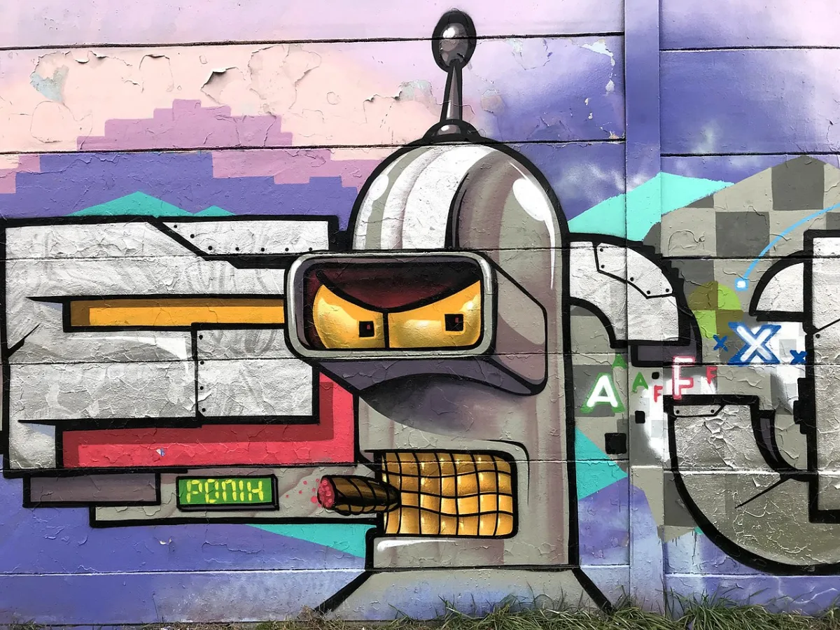 Colorful robot graffiti on urban wall