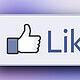Like button with thumbs-up icon on digital interface, representing social media engagement and user approval.