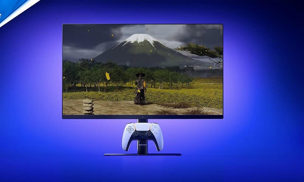 Mount Fuji landscape displayed on a gaming monitor with a PlayStation controller, showcasing advanced gaming technology and high-resolution visuals.