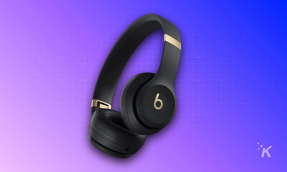 Over-ear wireless headphones with sleek black design, featuring gold details, perfect for immersive music listening and on-the-go use.