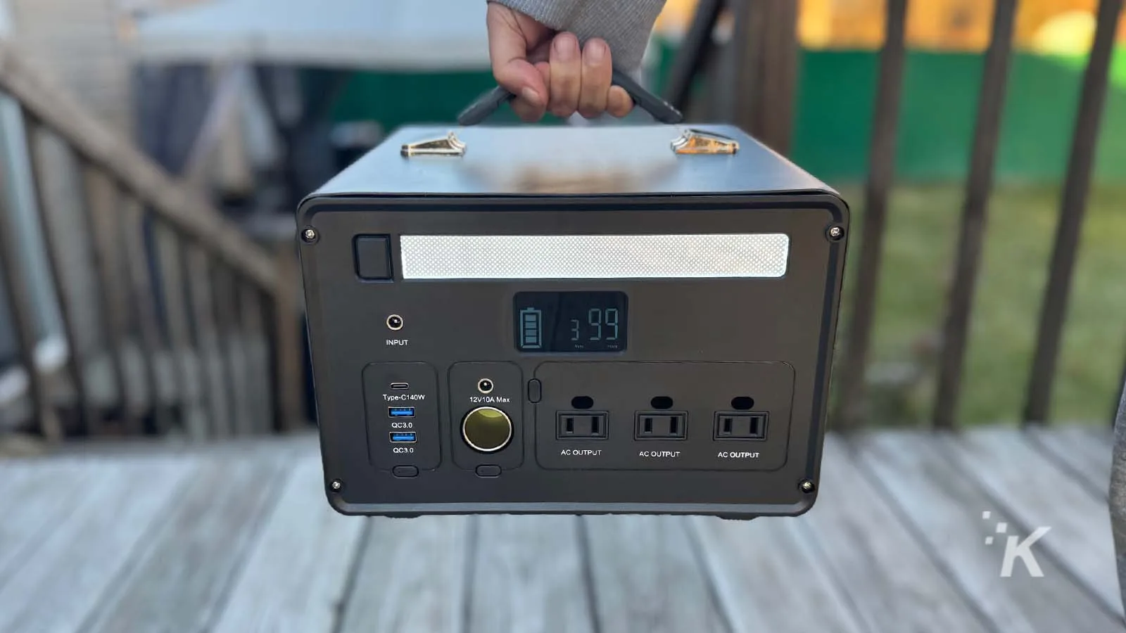 High-capacity portable power station with multiple AC outlets, USB ports, and digital display for battery status, ideal for outdoor activities or emergency backup.