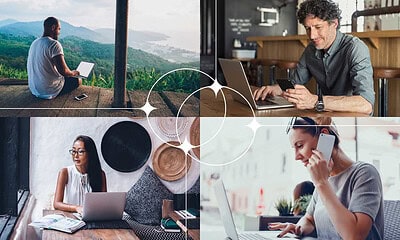 Young person using a laptop outdoors with scenic mountain view.
