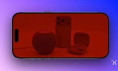 High-quality image of a smartphone displaying a collection of smart tech devices like speakers, earbuds, and smart home accessories, emphasizing the latest in consumer electronics and gadget reviews.