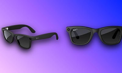Black Ray-Ban sunglasses with dark lenses showcased on colorful gradient backdrop.