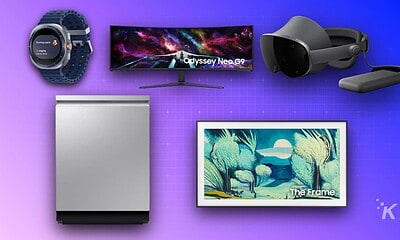 A collection of modern tech gadgets including a curved monitor, virtual reality headset, smartwatch, LED refrigerator, and a digital art frame on vibrant purple background.