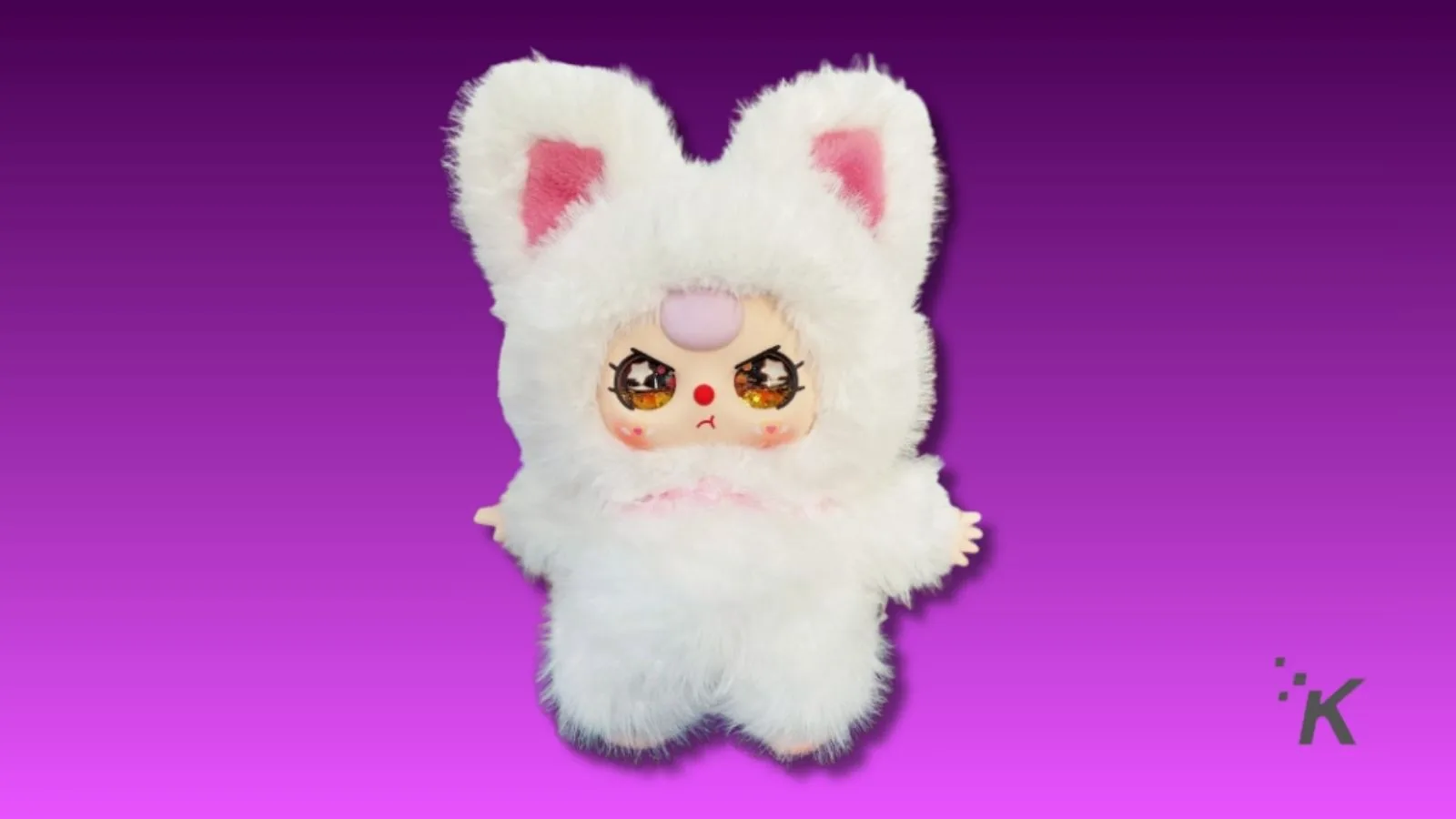 Cute plush toy with a bunny hoodie and anime-style face, vibrant large eyes, and a pink nose. Perfect for kawaii collectors and fans of adorable, whimsical plushies.