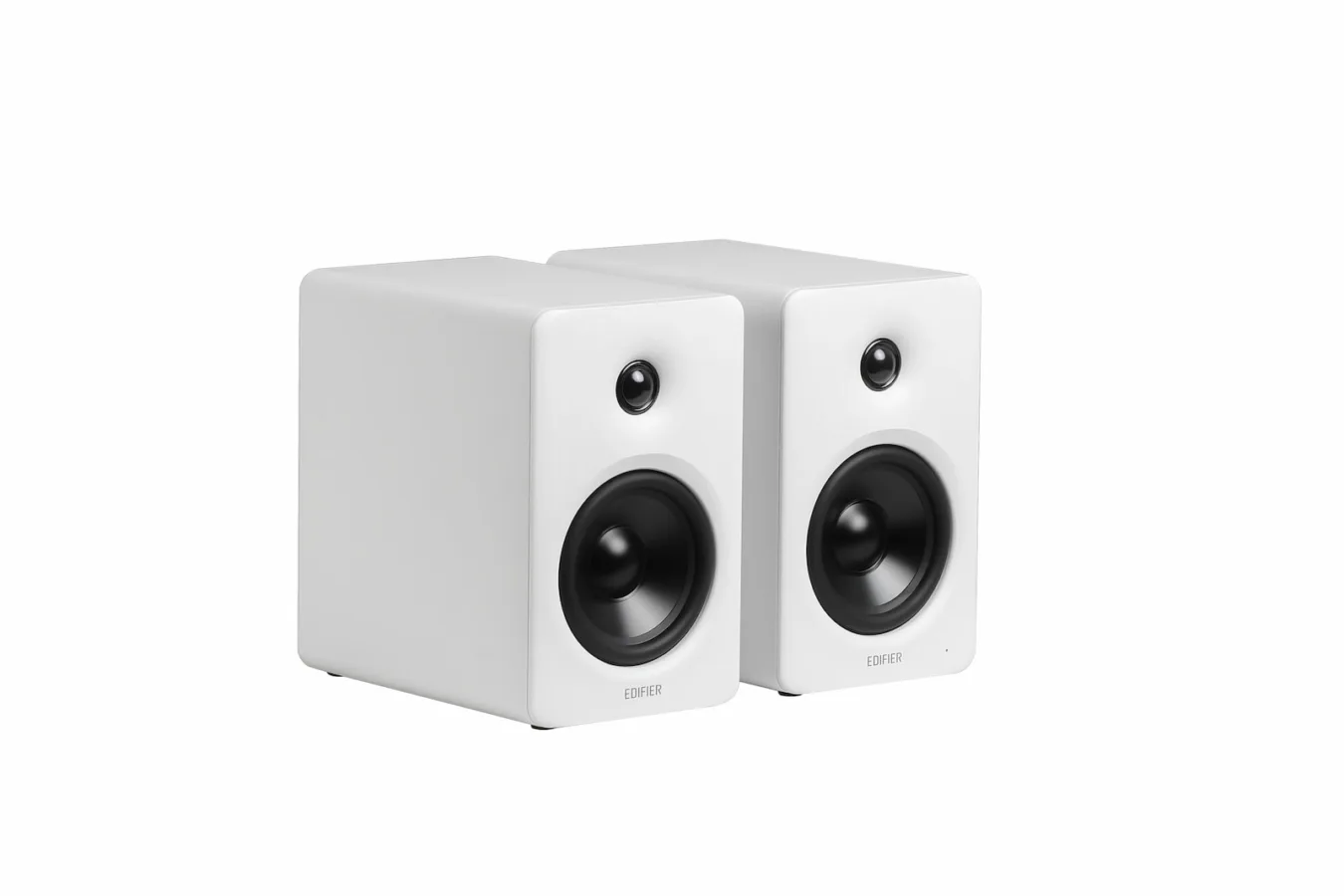 Wireless white bookshelf speakers with black drivers for home or studio use.