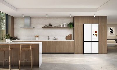 Bright and stylish kitchen featuring sleek wood cabinetry, a built-in smart refrigerator, and modern decor for contemporary home technology.